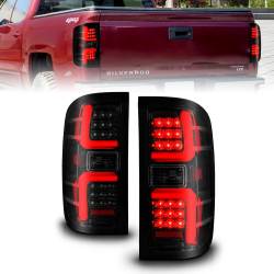 ANZO USA - Tail Light Set LED W/ Light Bar Style Sequential Black Housing Smoke Lens Pair Chevrolet Silverado 1500 2014-2018, 2500 HD/3500 HD 2015-2019, GMC Sierra 3500 HD 2015-2019 ANZO USA - Image 1